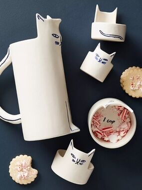 Anthropologie Kaye Blegvad cat measuring CUPS